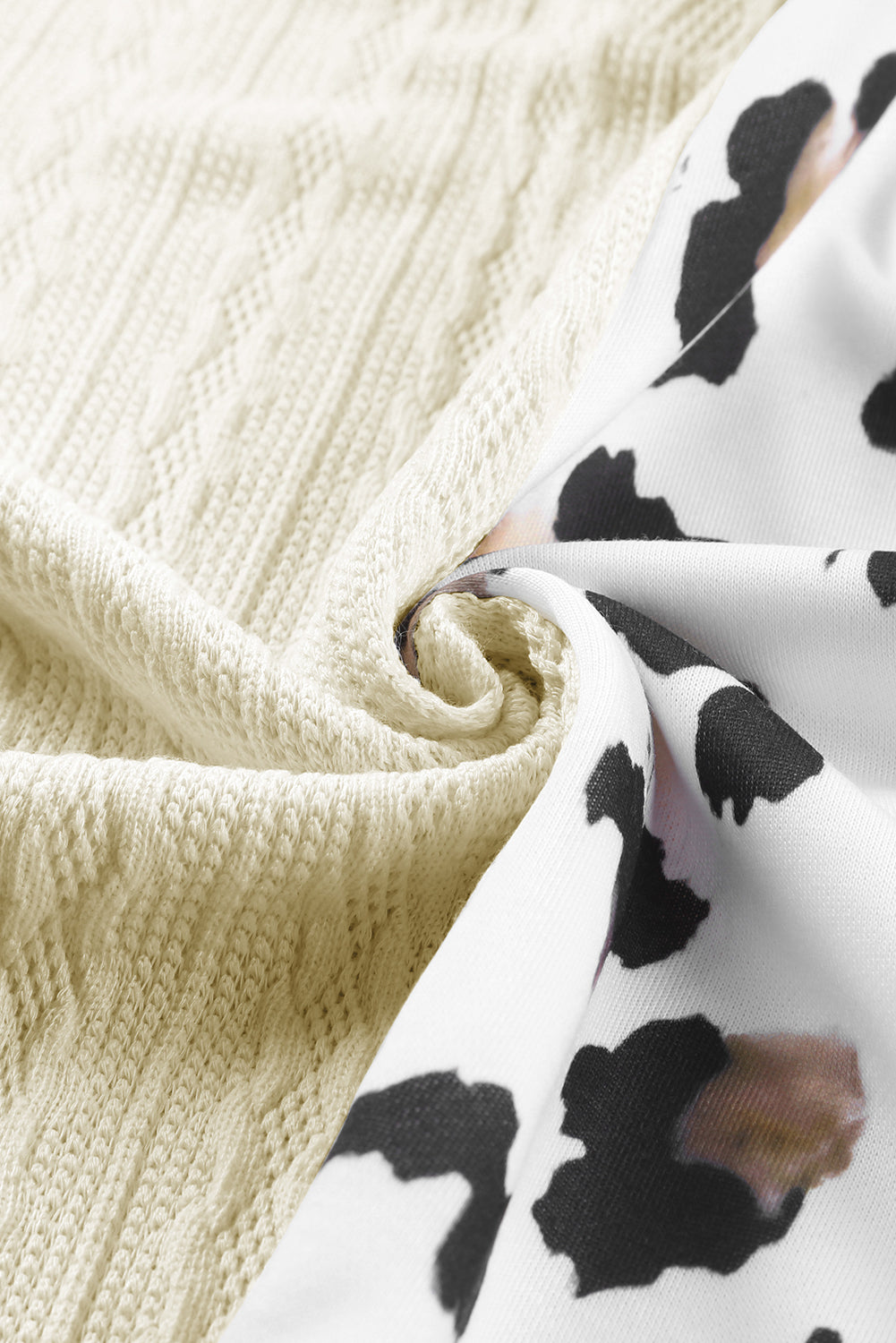 Black Asymmetric Leopard Patchwork Wide Sleeve V Neck Sweater showcasing a stylish design with leopard print splicing and wide sleeves.