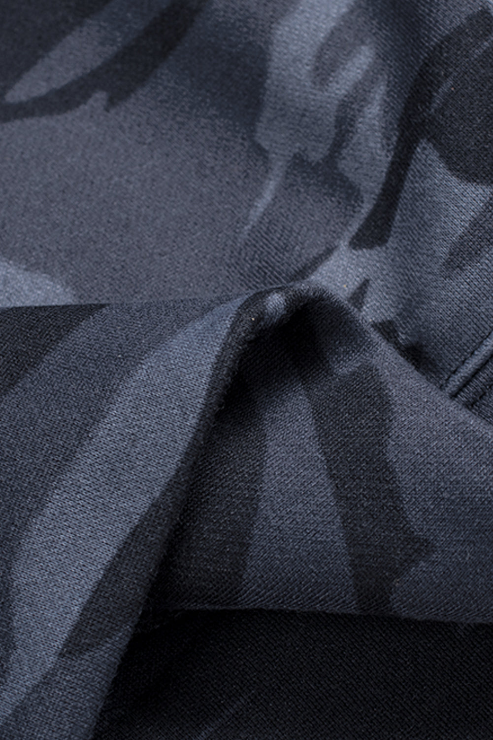 Black camo print zip-up hooded coat with pockets, showcasing a stylish design suitable for casual wear.