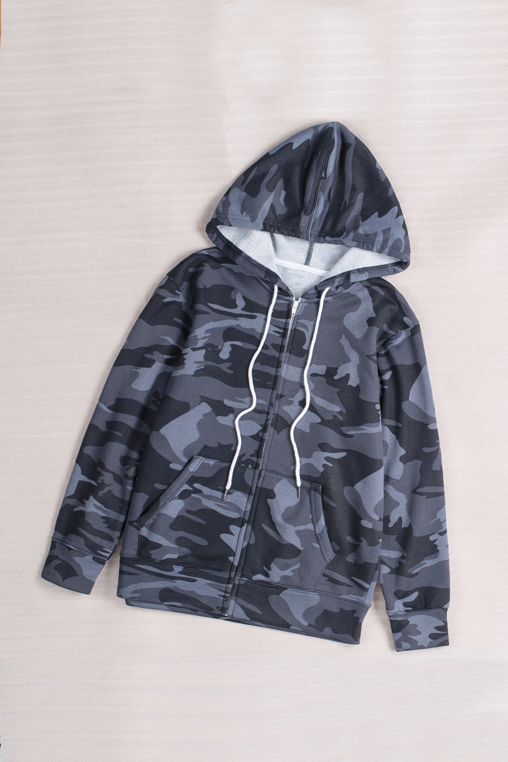 Black camo print zip-up hooded coat with pockets, showcasing a stylish design suitable for casual wear.