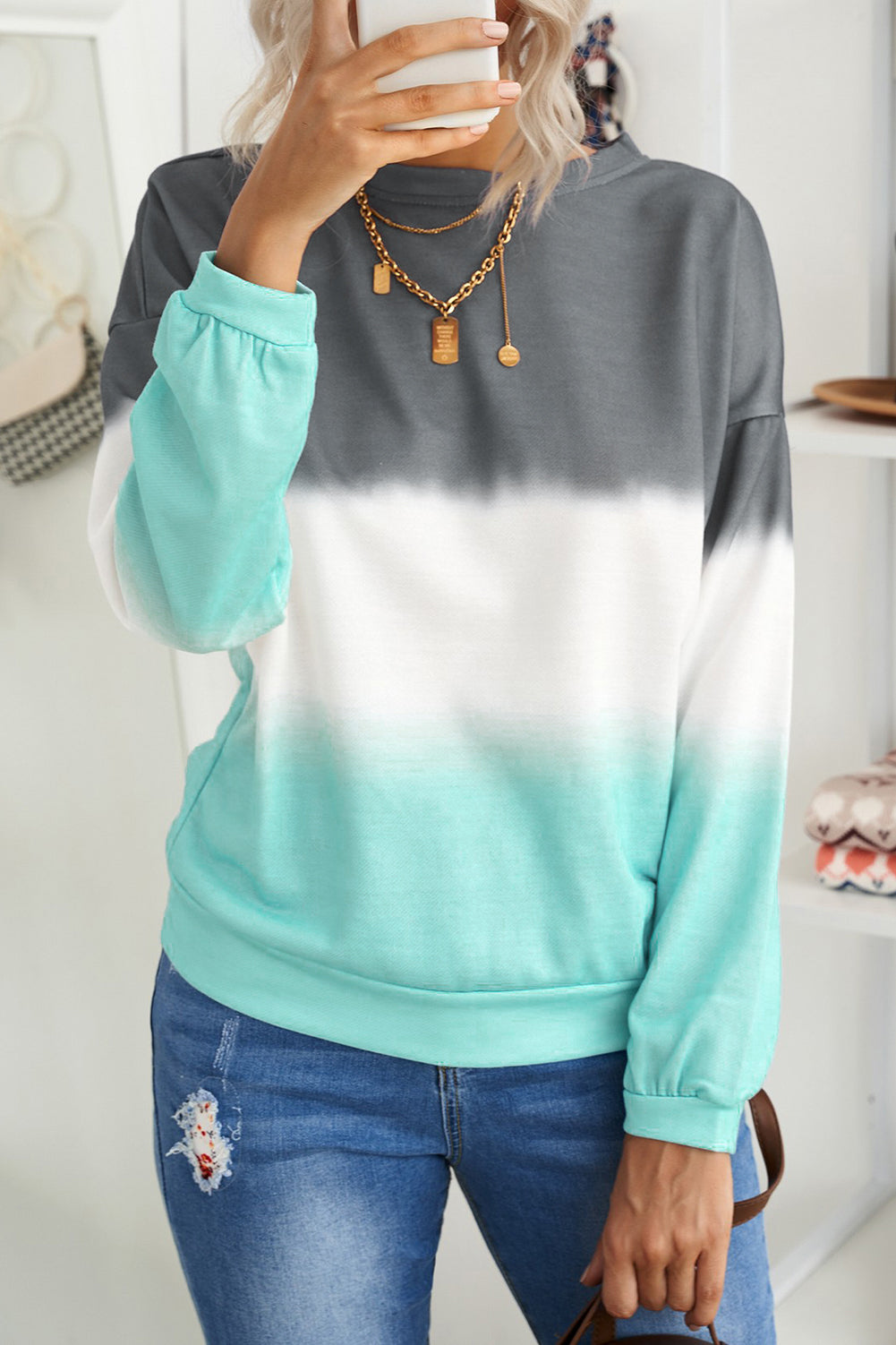 Black Color Block Tie Dye Pullover Sweatshirt with oversized fit and gathered cuffs, showcasing a unique hand-dipped tie dye pattern.