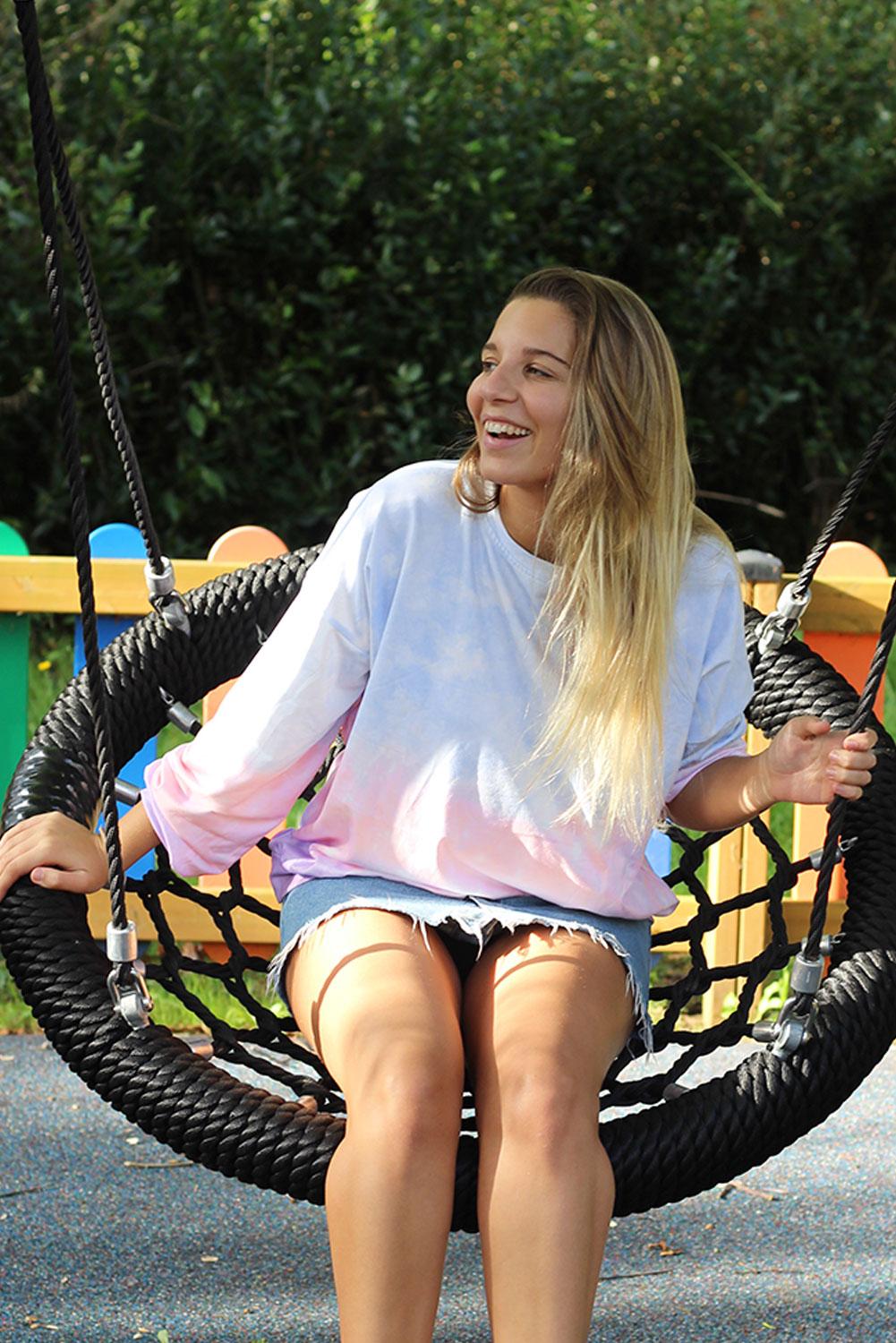 Black Color Block Tie Dye Pullover Sweatshirt with oversized fit and gathered cuffs, showcasing a unique hand-dipped tie dye pattern.