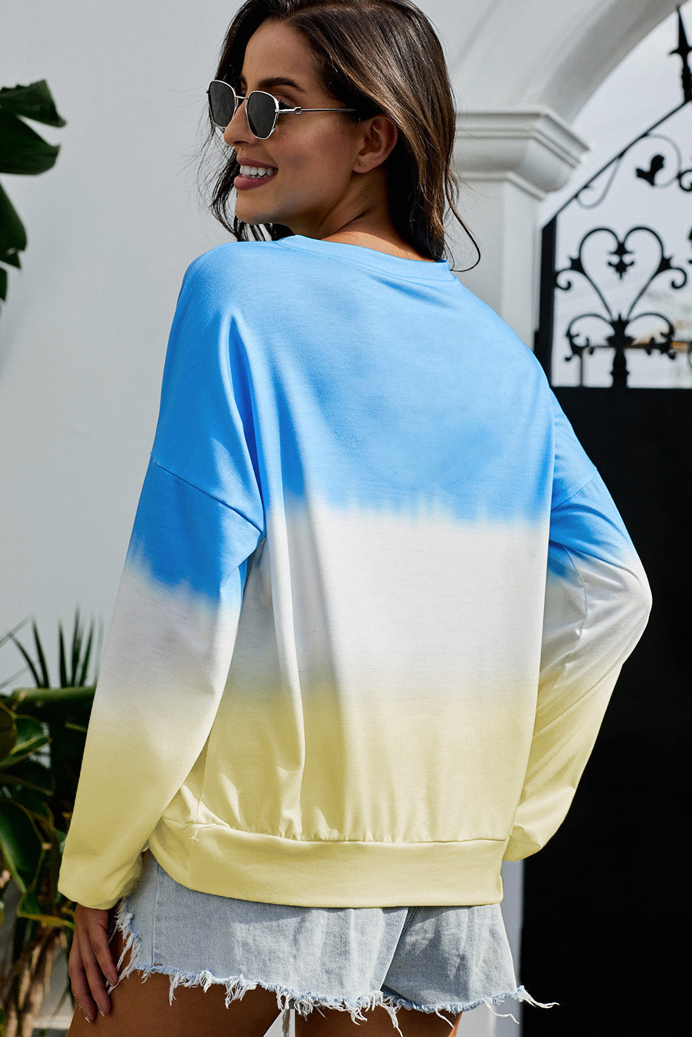 Black Color Block Tie Dye Pullover Sweatshirt with oversized fit and gathered cuffs, showcasing a unique hand-dipped tie dye pattern.