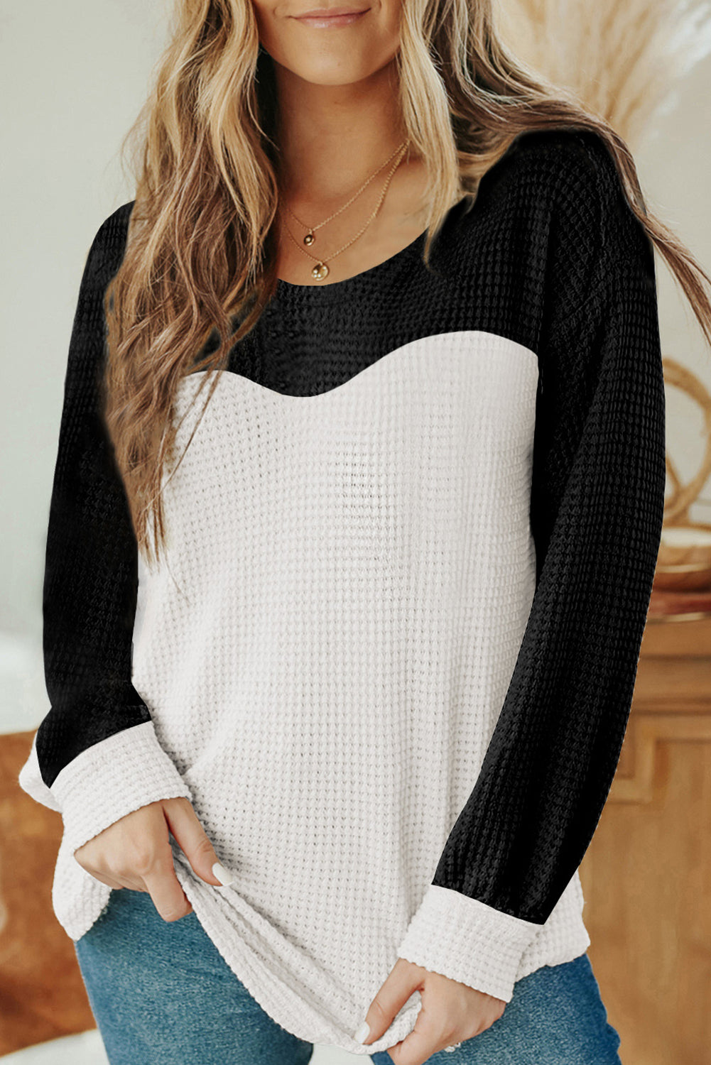 Black Contrast Color Waffle Knit Long Sleeve Top featuring a stylish colorblock design and waffle knit texture, perfect for layering.