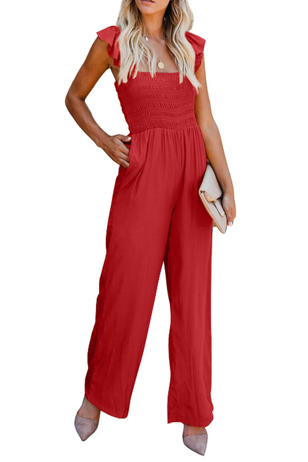 A stylish black jumpsuit featuring flutter sleeves, a smocked bodice, and wide leg bottoms, perfect for any occasion.