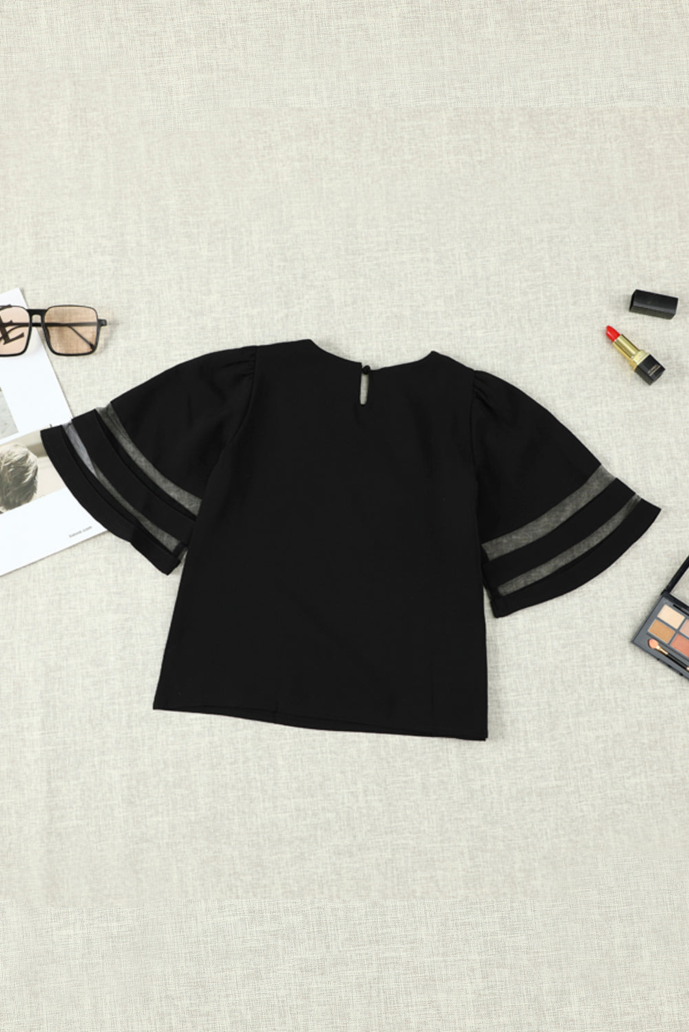 Black Girl's 3/4 Bell Sleeve Mesh Panel Blouse featuring sheer mesh panels and a stylish peek-a-boo back.