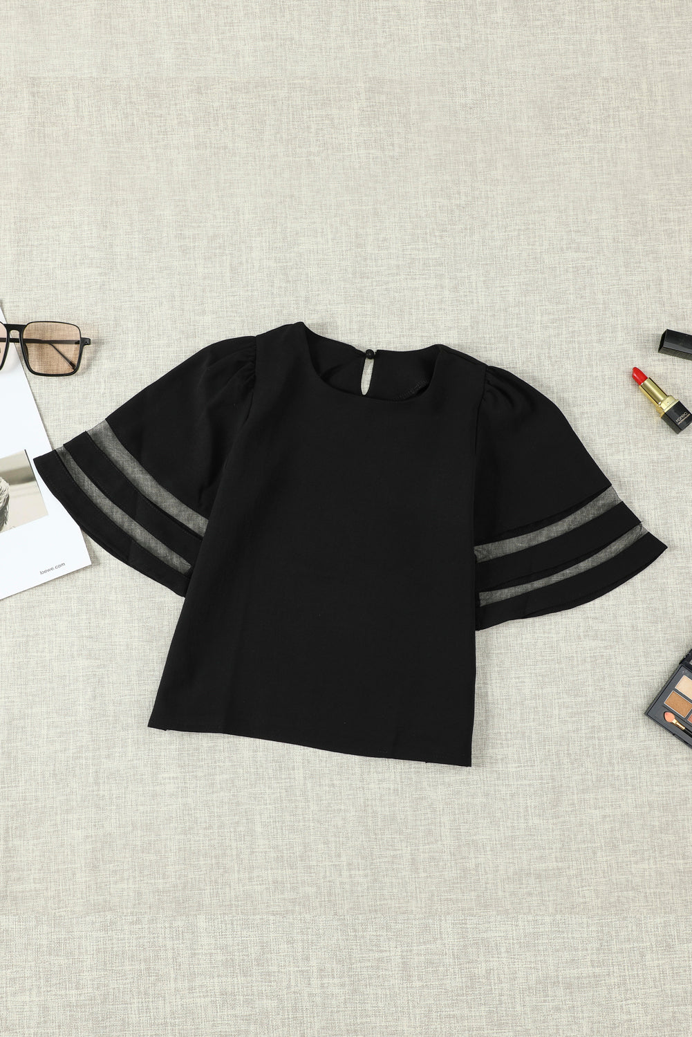 Black Girl's 3/4 Bell Sleeve Mesh Panel Blouse featuring sheer mesh panels and a stylish peek-a-boo back.