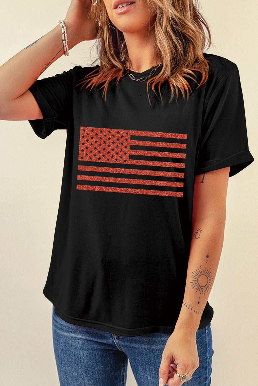 Black Glitter American Flag Round Neck Graphic T-Shirt showcasing a sparkling flag design on a black background.