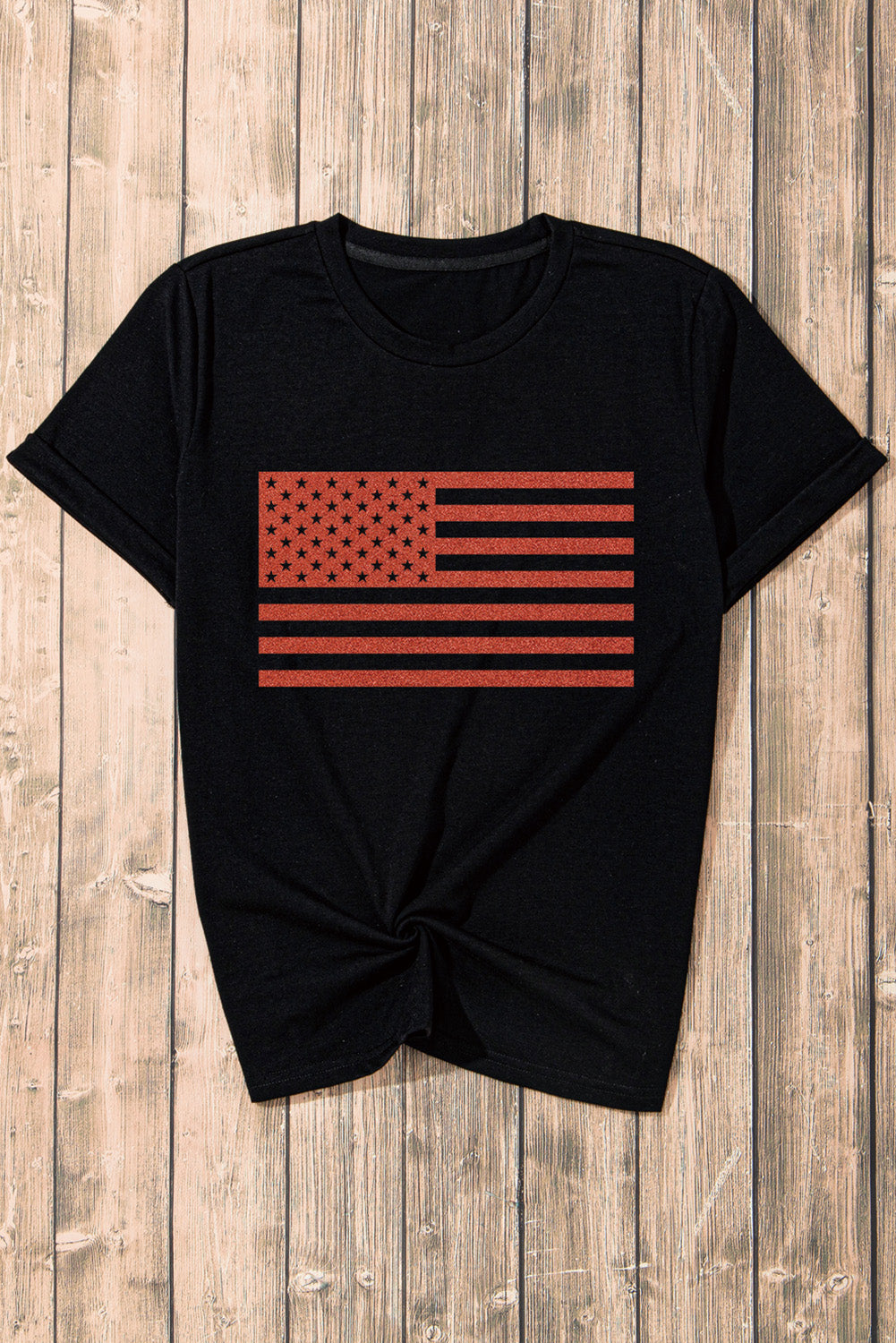 Black Glitter American Flag Round Neck Graphic T-Shirt showcasing a sparkling flag design on a black background.