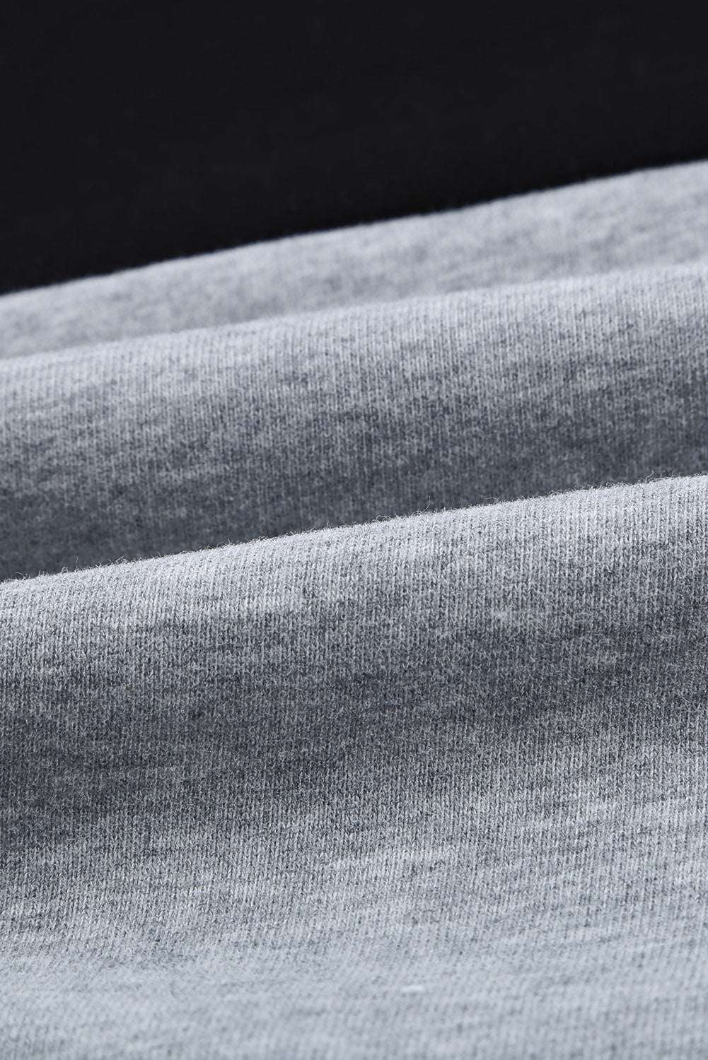 Black Leopard Splicing Kangaroo Pocket Drawstring Hoodie featuring camouflage and leopard print design with a wide neckline and kangaroo pocket.