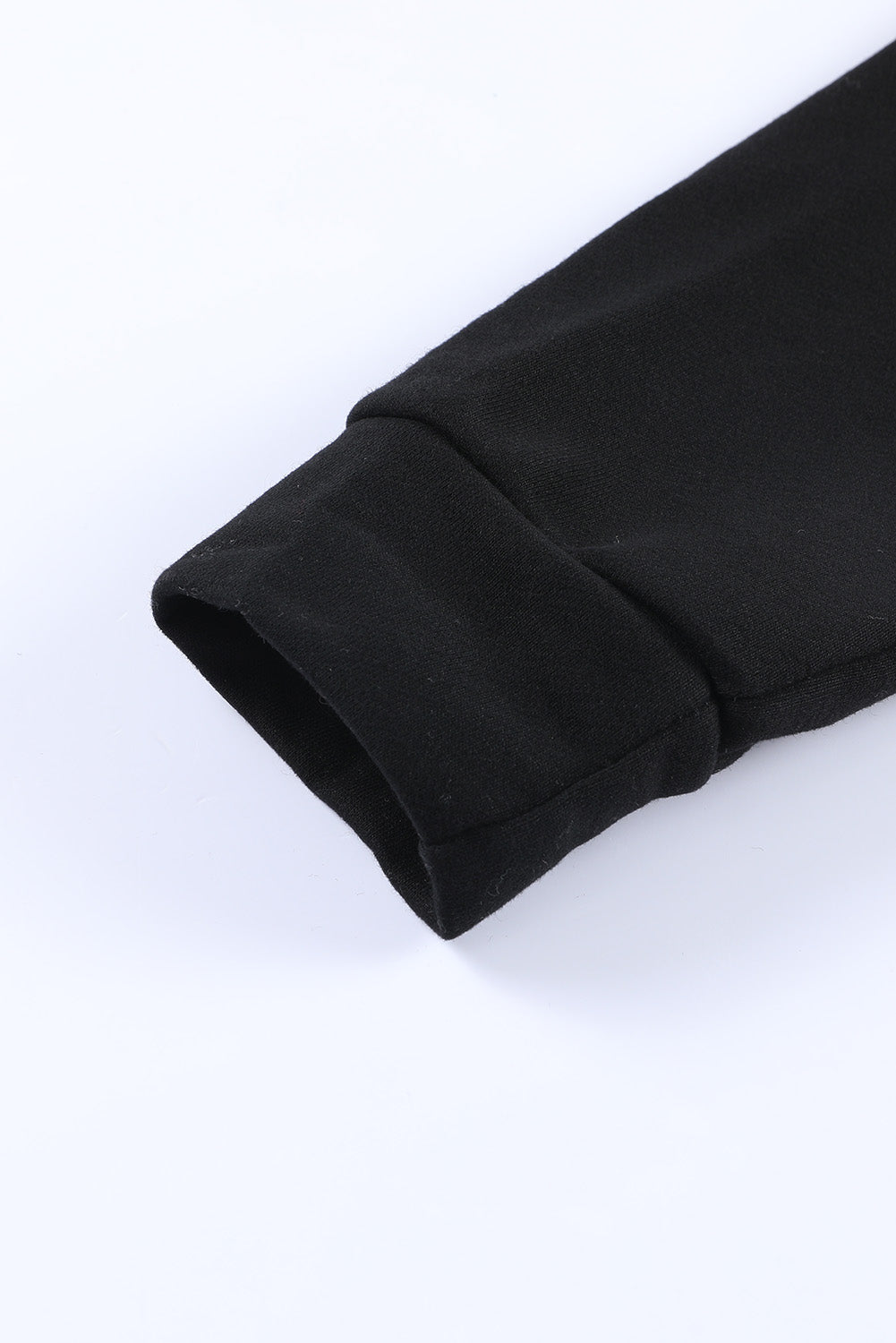 Black Leopard Splicing Kangaroo Pocket Drawstring Hoodie featuring camouflage and leopard print design with a wide neckline and kangaroo pocket.