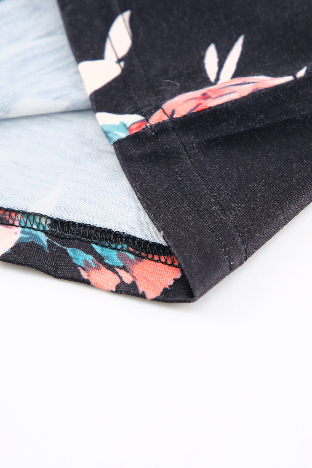 Black Leopard Striped Floral T Shirt featuring a mix of floral and animal prints with a comfortable crew neck and short sleeves.