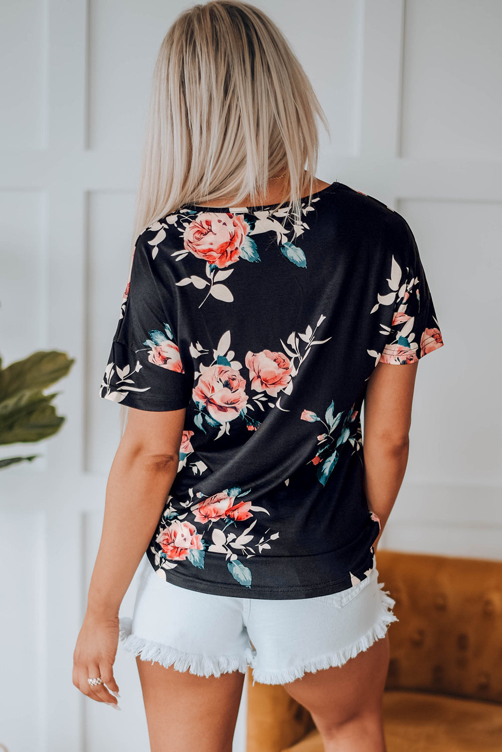 Black Leopard Striped Floral T Shirt featuring a mix of floral and animal prints with a comfortable crew neck and short sleeves.