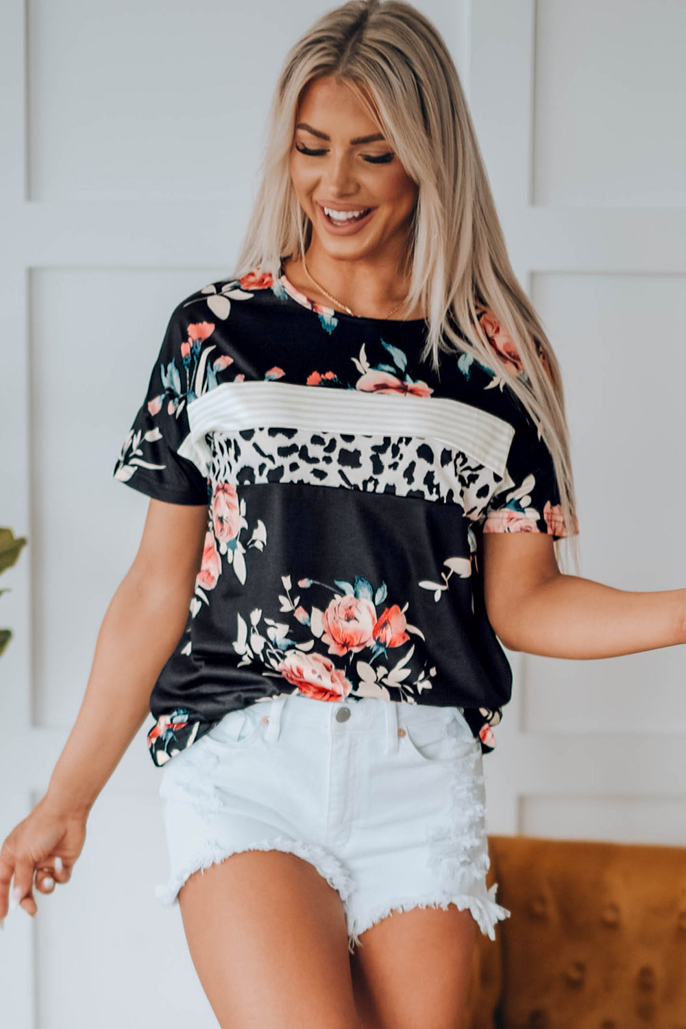 Black Leopard Striped Floral T Shirt featuring a mix of floral and animal prints with a comfortable crew neck and short sleeves.