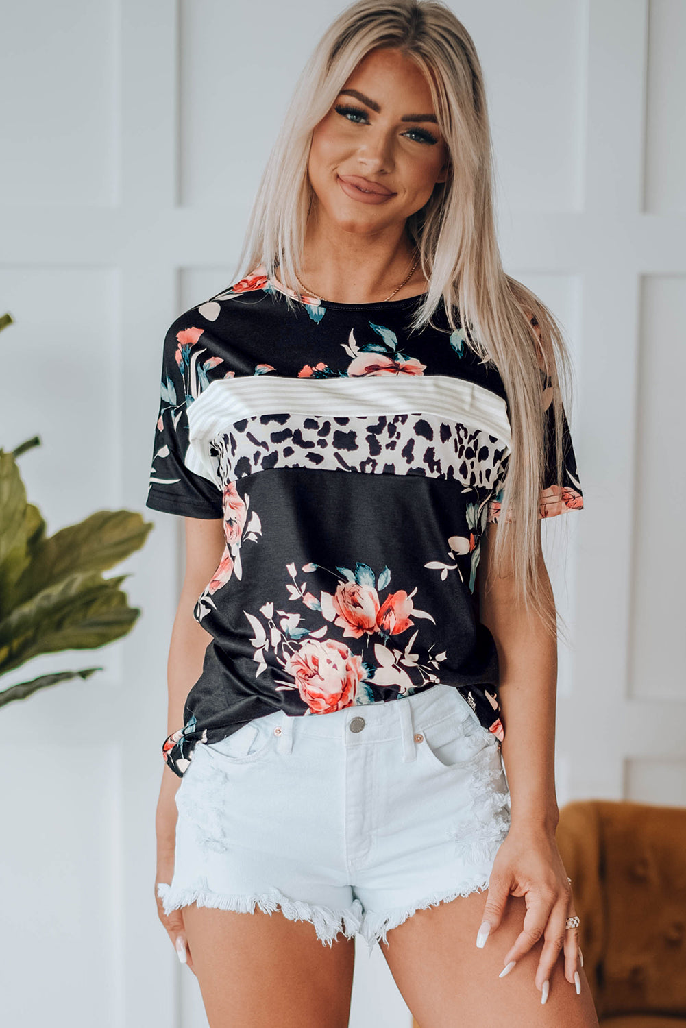Black Leopard Striped Floral T Shirt featuring a mix of floral and animal prints with a comfortable crew neck and short sleeves.