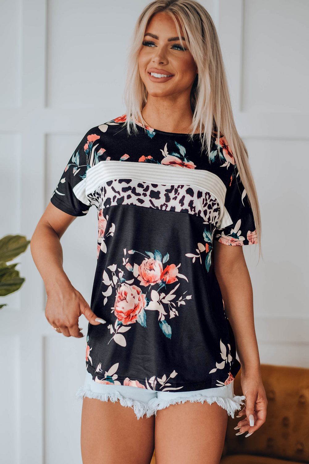 Black Leopard Striped Floral T Shirt featuring a mix of floral and animal prints with a comfortable crew neck and short sleeves.