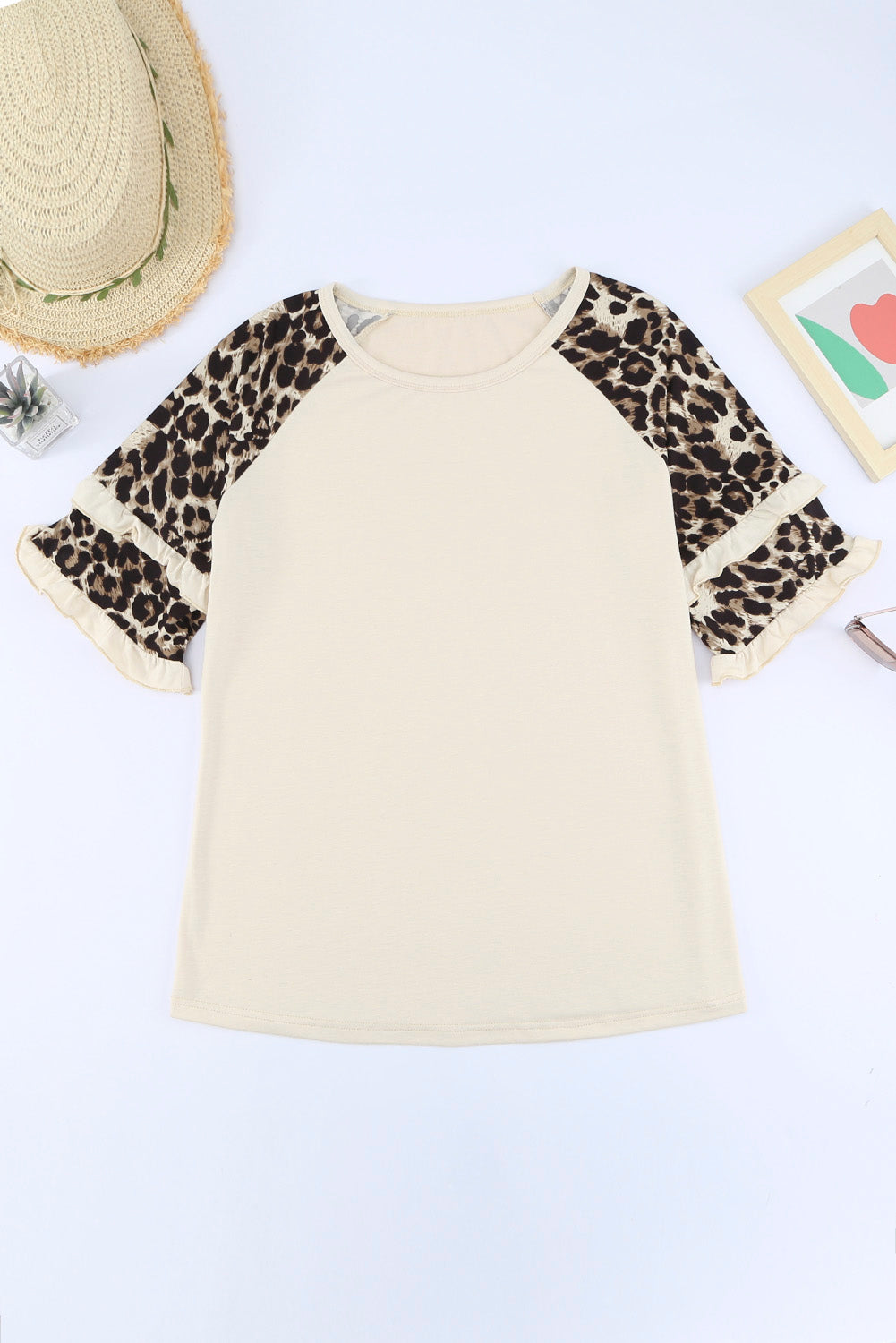 Black Ruffled Leopard Sleeve Patchwork Top featuring chic leopard print and ruffled sleeves, perfect for casual and stylish outfits.