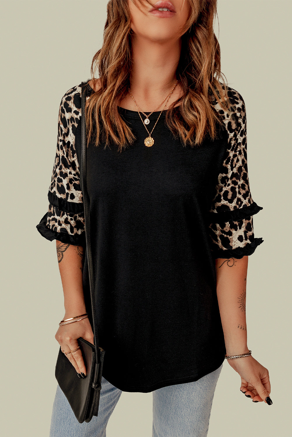 Black Ruffled Leopard Sleeve Patchwork Top featuring chic leopard print and ruffled sleeves, perfect for casual and stylish outfits.