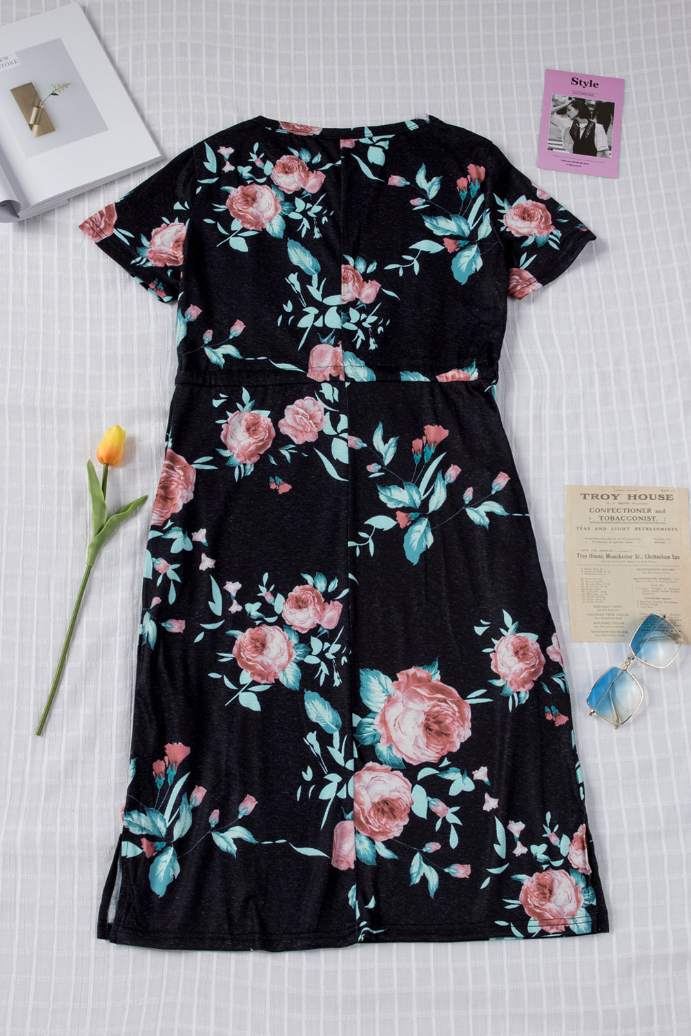 Black short sleeve casual floral dress with pockets and drawstring waist, perfect for summer outings.