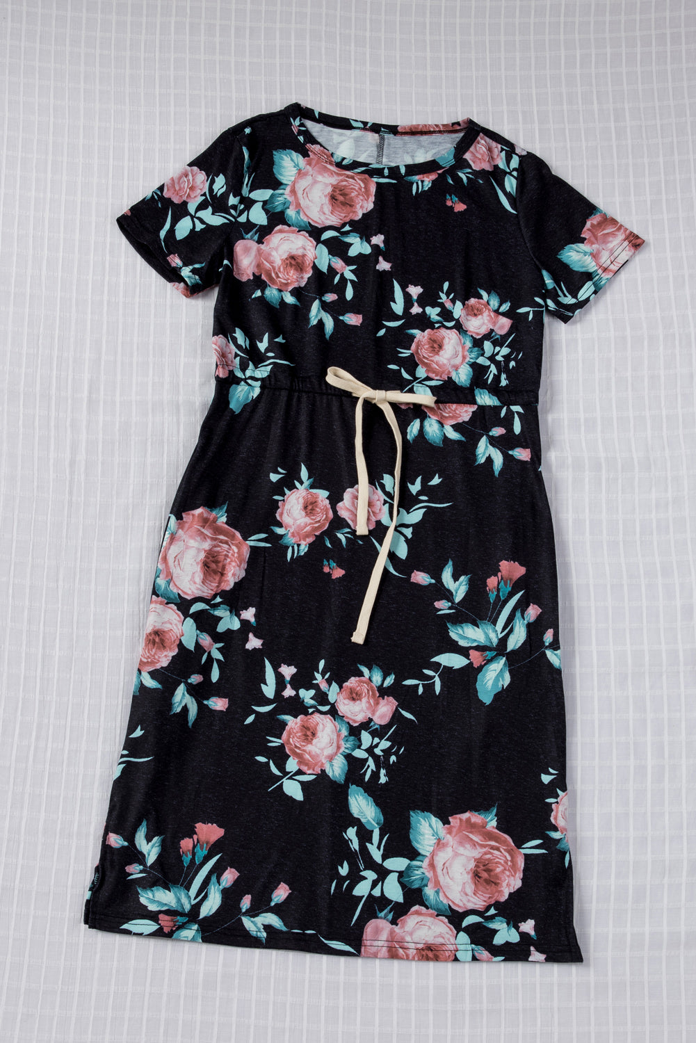 Black short sleeve casual floral dress with pockets and drawstring waist, perfect for summer outings.