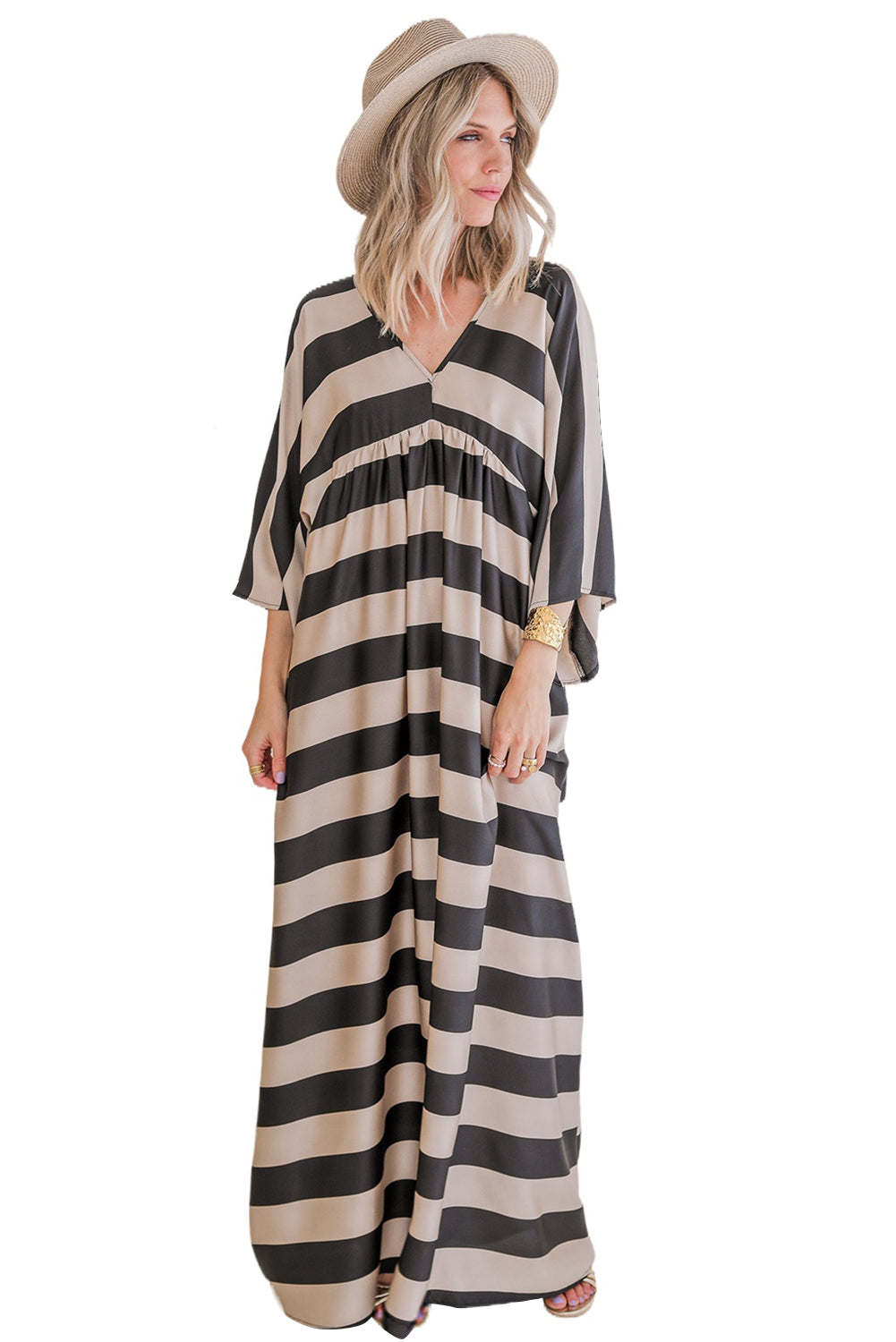 A stylish black maxi dress featuring a v neck and kimono sleeves, adorned with a classic striped print, perfect for elegant occasions.