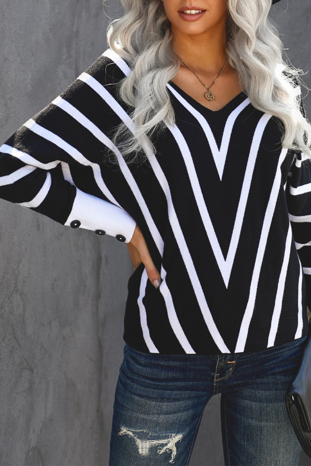 Black V Neck Popper Cuff Striped Casual Sweater featuring a deep V neck and elastic cuffs, styled with a classic chevron striped pattern.