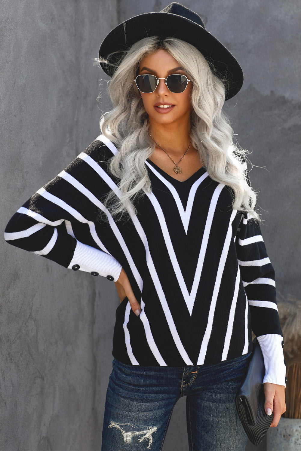 Black V Neck Popper Cuff Striped Casual Sweater featuring a deep V neck and elastic cuffs, styled with a classic chevron striped pattern.