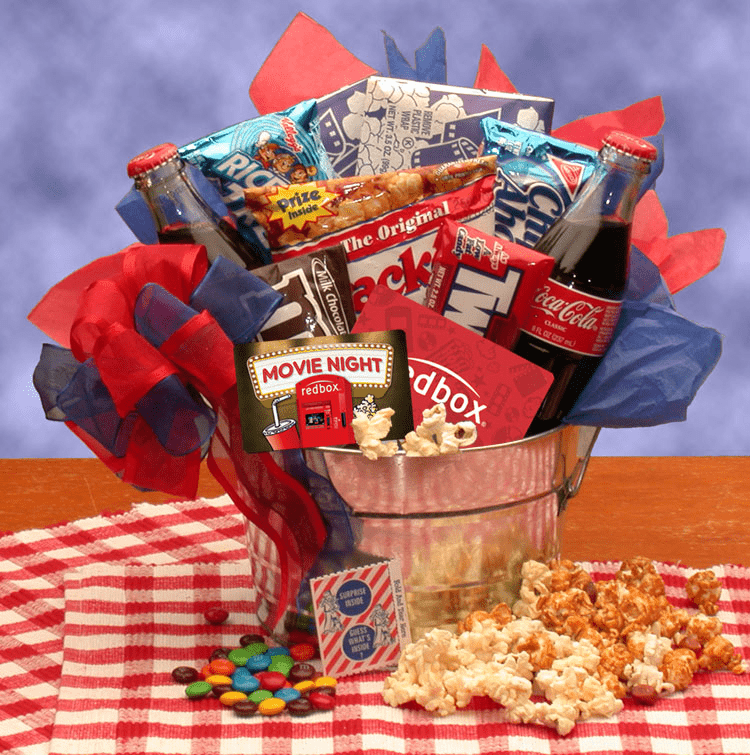 Blockbuster Night Movie Gift Pail filled with snacks and drinks, including popcorn, candy, and classic Coke, in a stylish metal container.