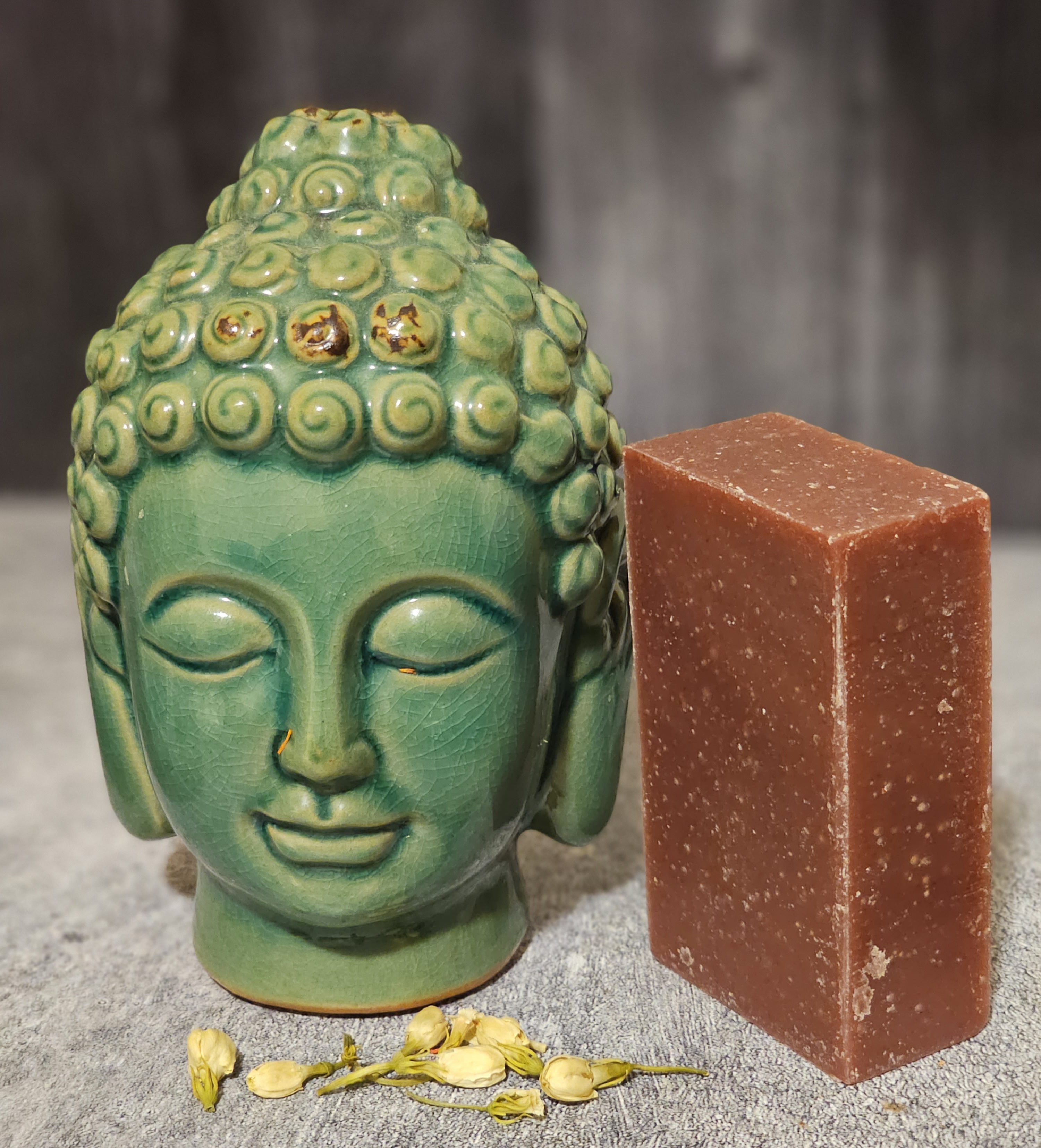 A vibrant Blood Orange Bergamot Soap bar showcasing its rich color and texture, emphasizing its organic and vegan ingredients.