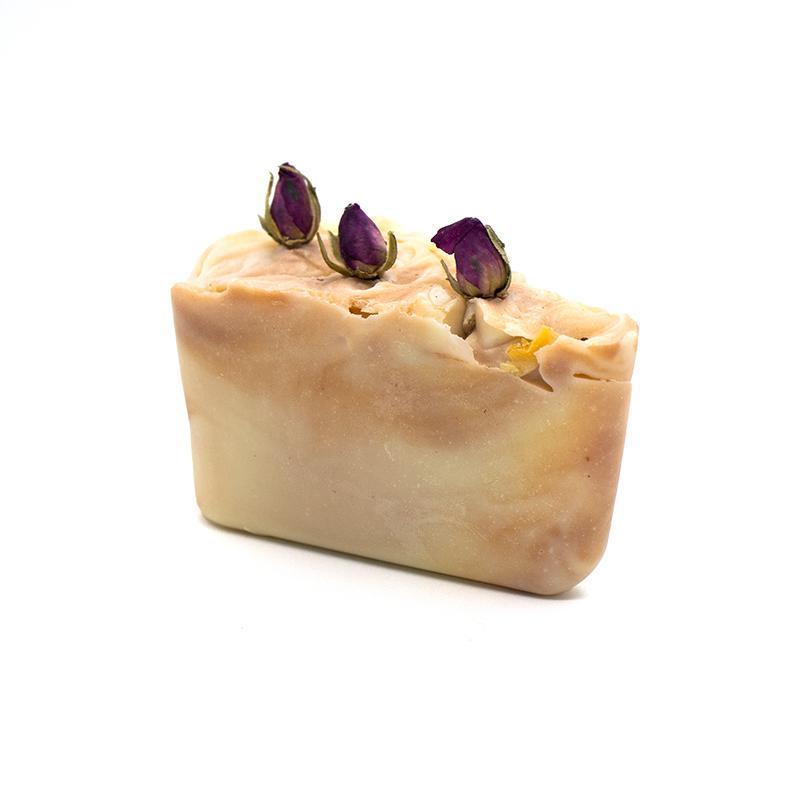 Blooming Marvellous Organic Soap with rose buds and pink swirls, showcasing its natural ingredients and elegant design.