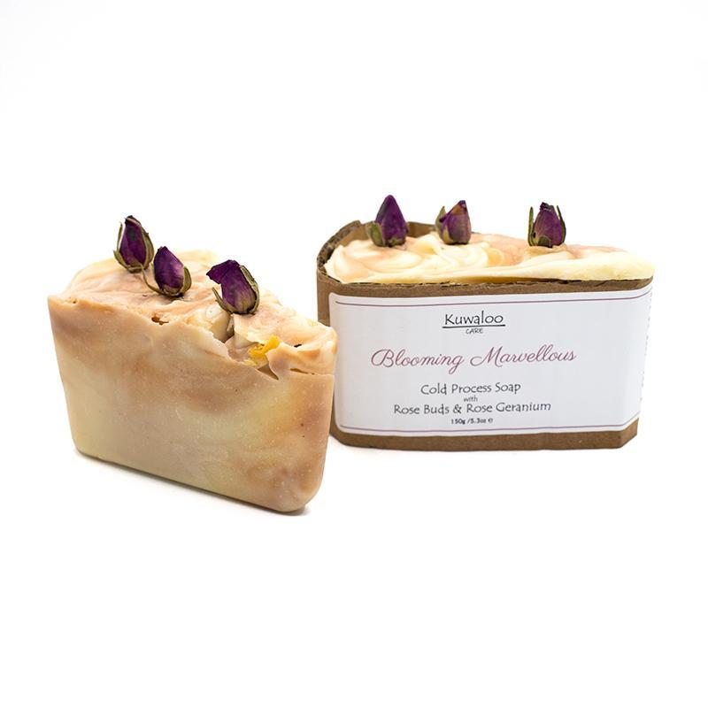 Blooming Marvellous Organic Soap with rose buds and pink swirls, showcasing its natural ingredients and elegant design.