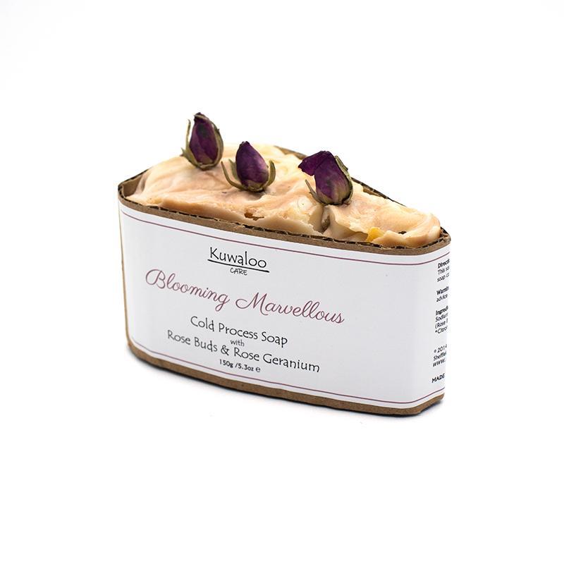 Blooming Marvellous Organic Soap with rose buds and pink swirls, showcasing its natural ingredients and elegant design.