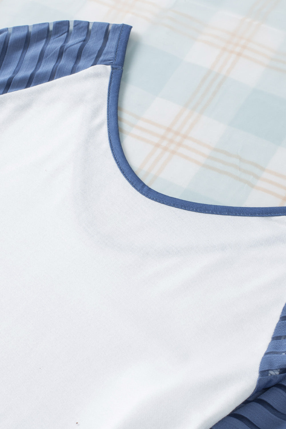 A stylish blue colorblock patchwork mesh long sleeve top featuring a big V neckline and elegant mesh sleeves, perfect for modern women.