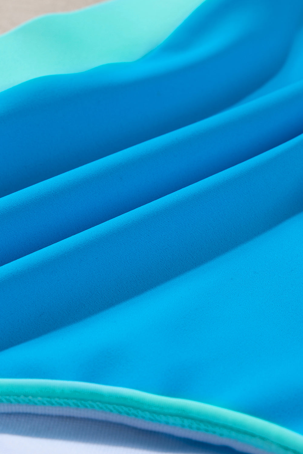 Blue Contrast Trim Crisscross Back High Waisted Bikini showcasing stylish design and comfortable fit.