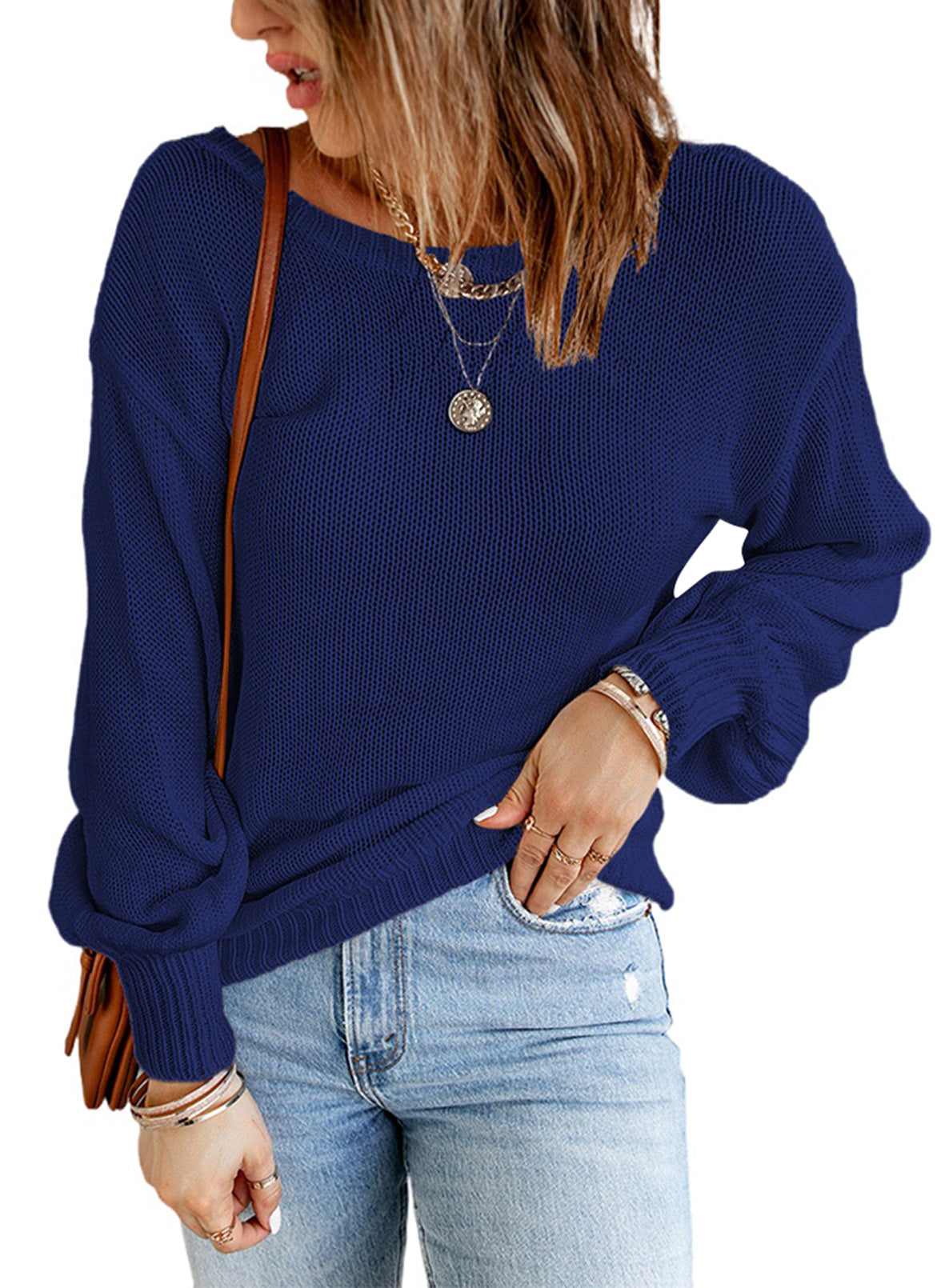 Blue drop shoulder sweater featuring a back cut-out and tie detail, showcasing a stylish and elegant design.