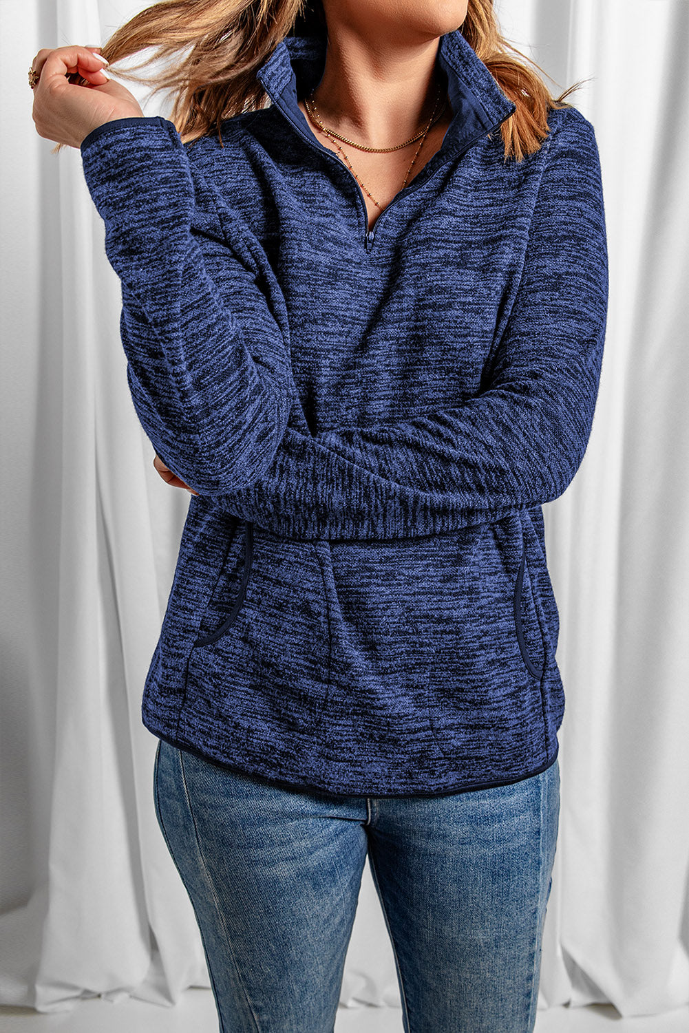 Blue Quarter Zip Pullover Sweatshirt featuring a kangaroo pocket and soft fabric, perfect for casual and sportswear.
