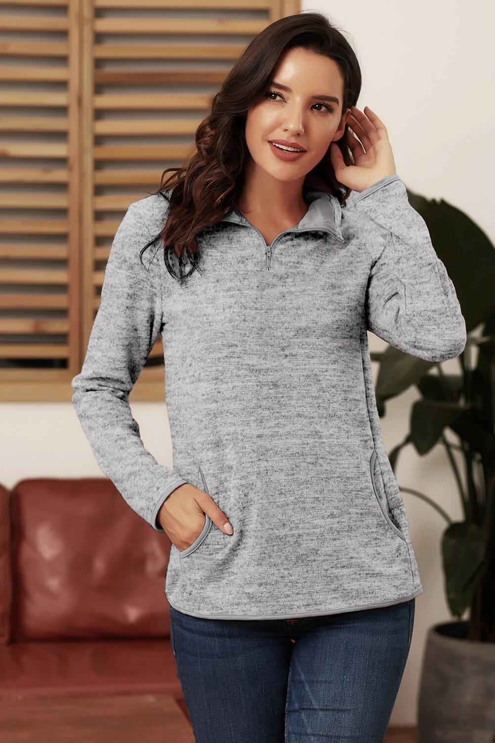 Blue Quarter Zip Pullover Sweatshirt featuring a kangaroo pocket and soft fabric, perfect for casual and sportswear.