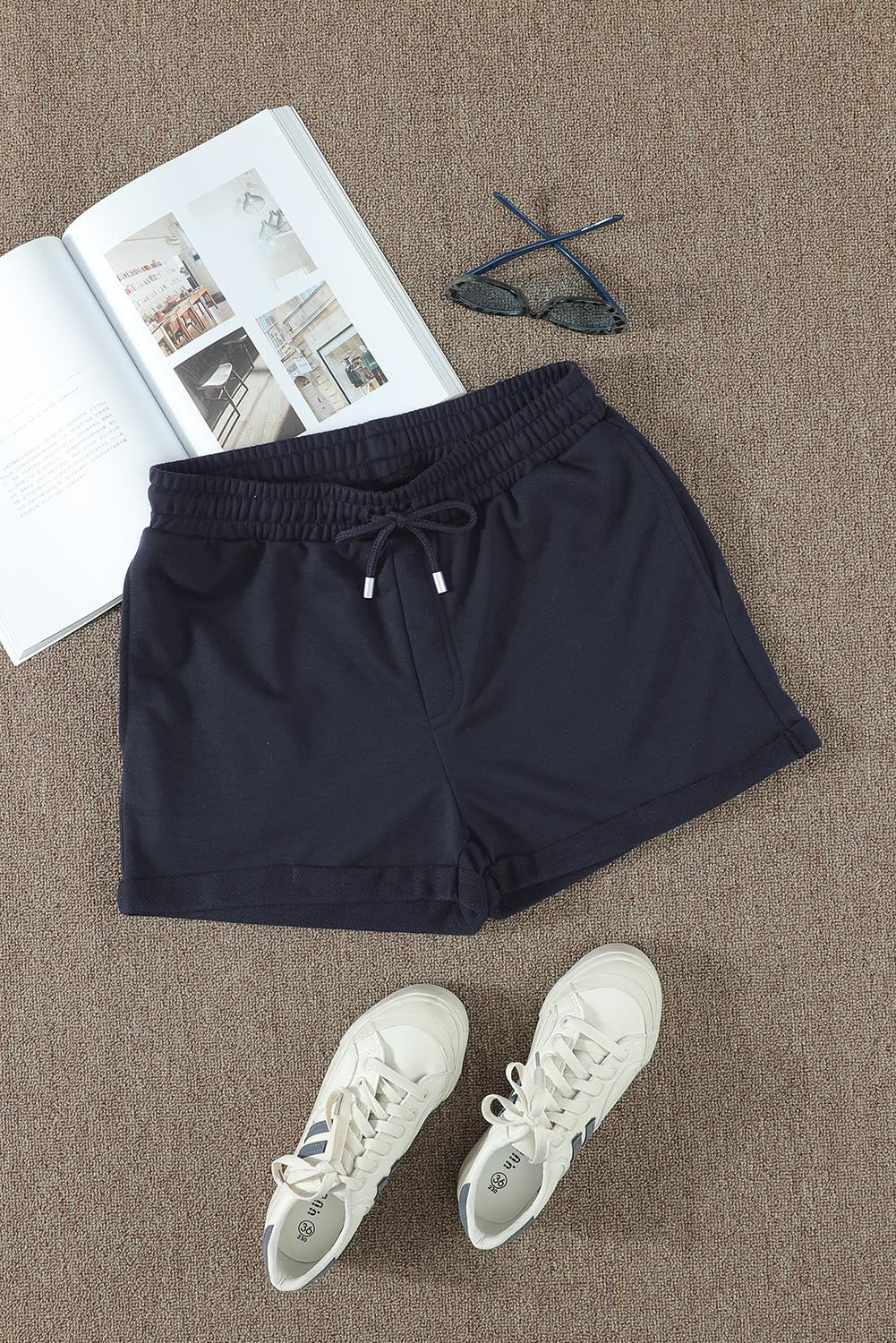 Blue tie waist cuffed lounge shorts with side pockets, perfect for summer wear.