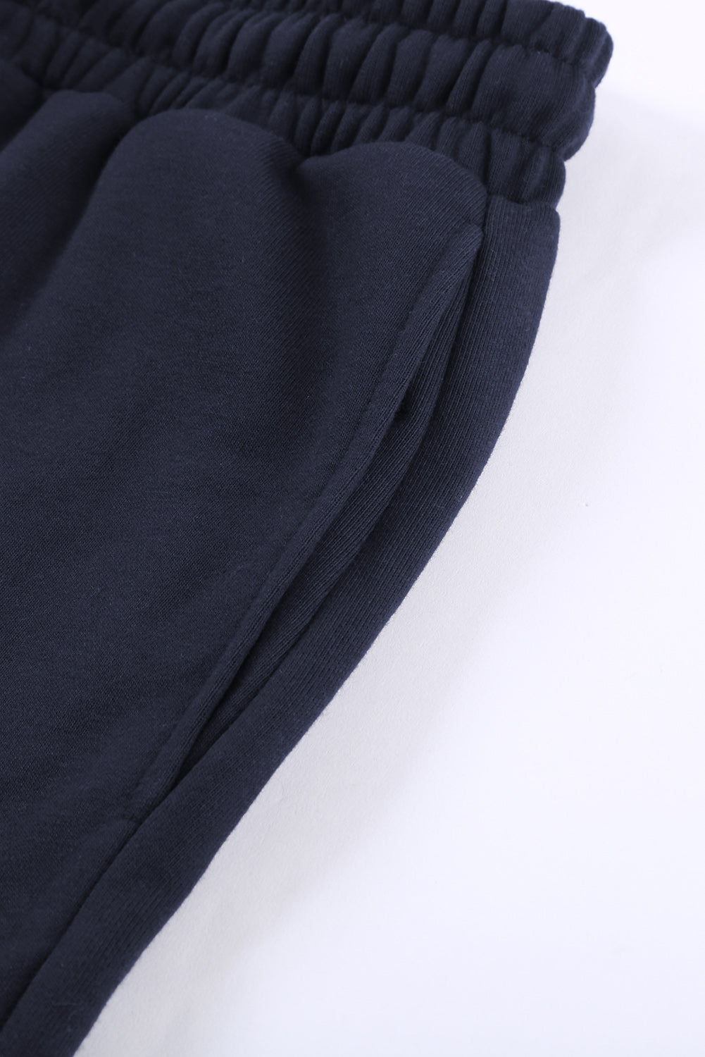 Blue tie waist cuffed lounge shorts with side pockets, perfect for summer wear.