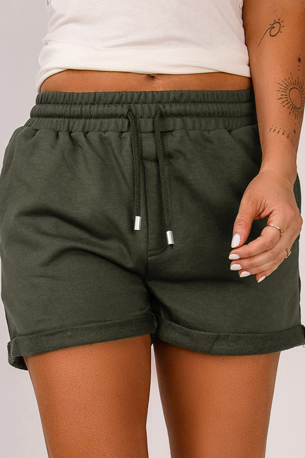 Blue tie waist cuffed lounge shorts with side pockets, perfect for summer wear.