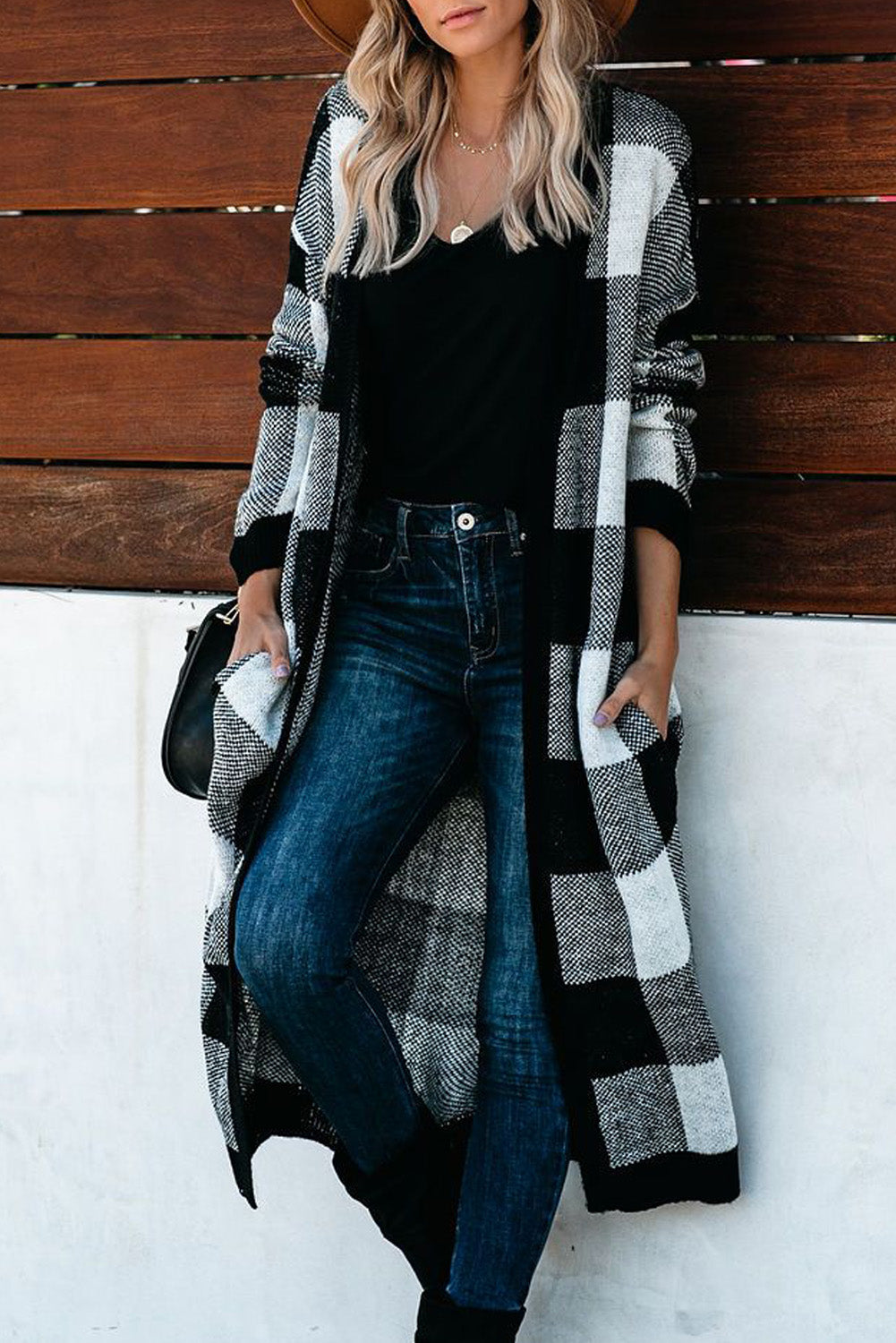 A stylish Board Games Pocketed Checkered Cardigan featuring a monochrome plaid print, open front design, and cozy fabric, perfect for chilly weather.
