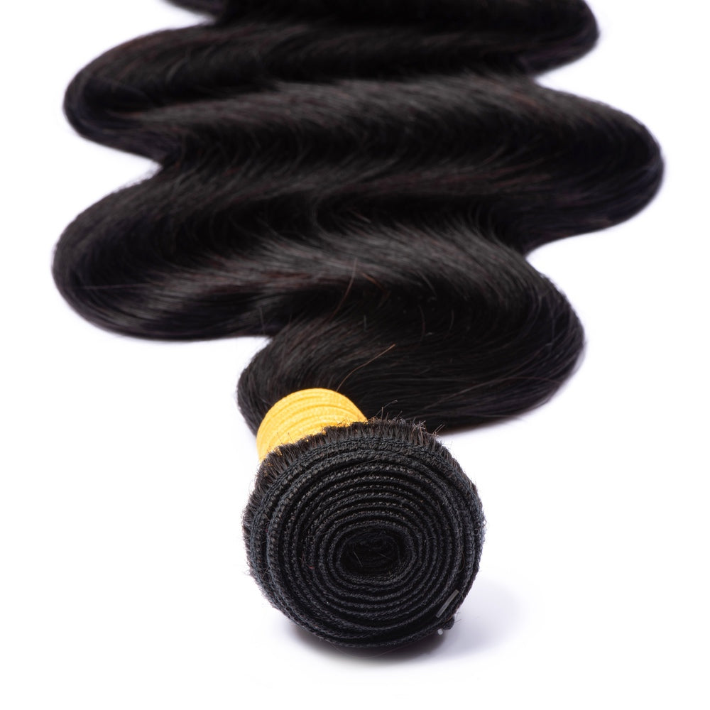 Body Wave Texture 100% Virgin Human Hair Bundles in natural black color, showcasing luxurious waves and high-quality weft construction.