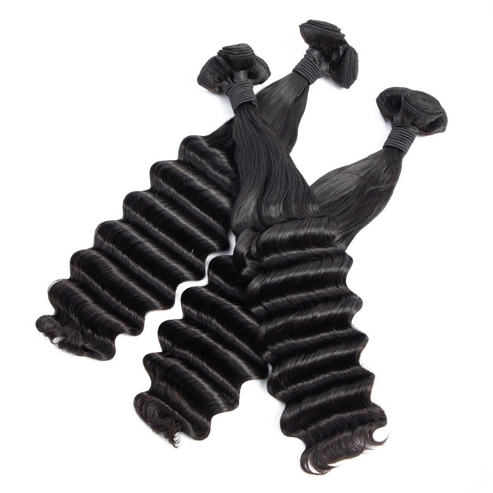 Brazilian 3/4 Fancy Deep Wavy Fumi Human Hair bundles with 4x4 Closure, showcasing luxurious waves and high-quality Swiss Lace.