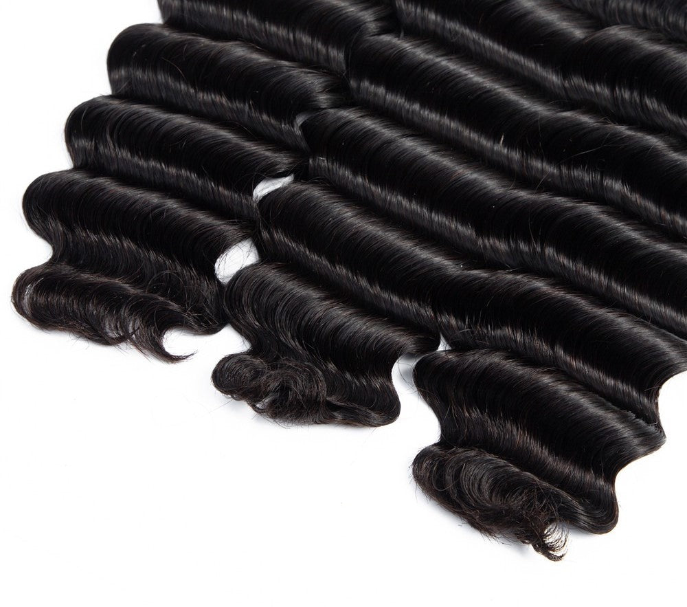 Brazilian 3/4 Fancy Deep Wavy Fumi Human Hair bundles with 4x4 Closure, showcasing luxurious waves and high-quality Swiss Lace.