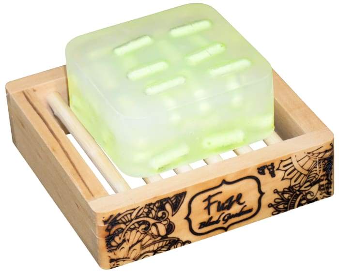 Breathe Clear Burst Bar with wooden soap dish, showcasing its vibrant colors and unique design.