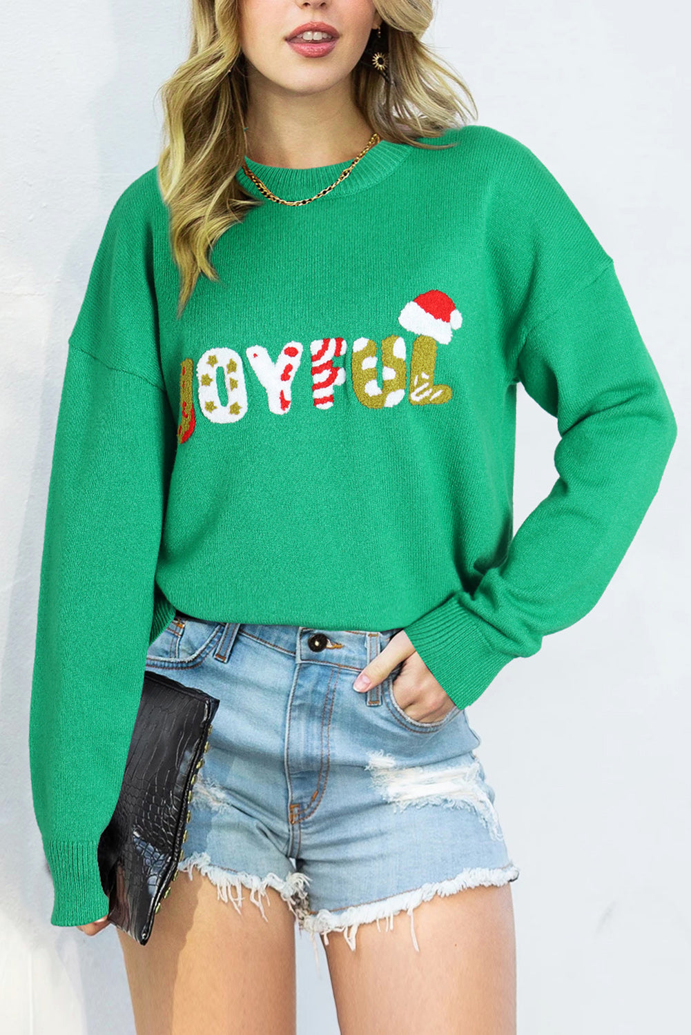 Bright green Christmas sweater featuring sequined JOYFUL graphic, perfect for festive occasions.