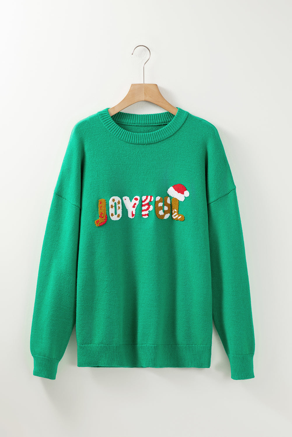 Bright green Christmas sweater featuring sequined JOYFUL graphic, perfect for festive occasions.