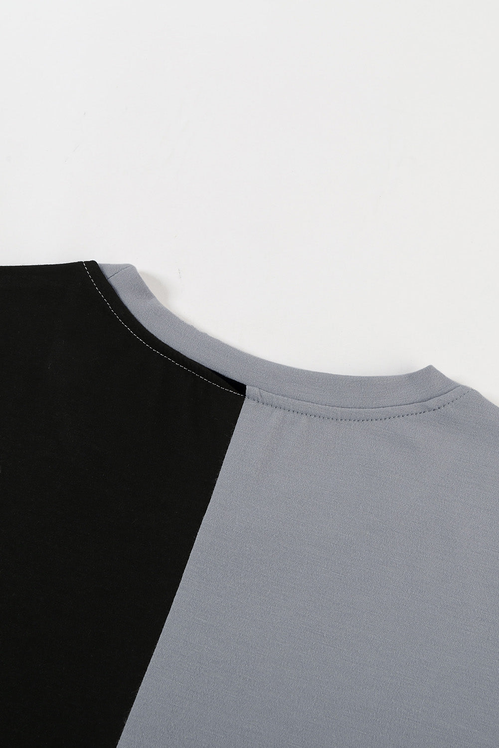 Brown Colorblock T-shirt featuring stylish side slits and a relaxed fit, perfect for casual wear.