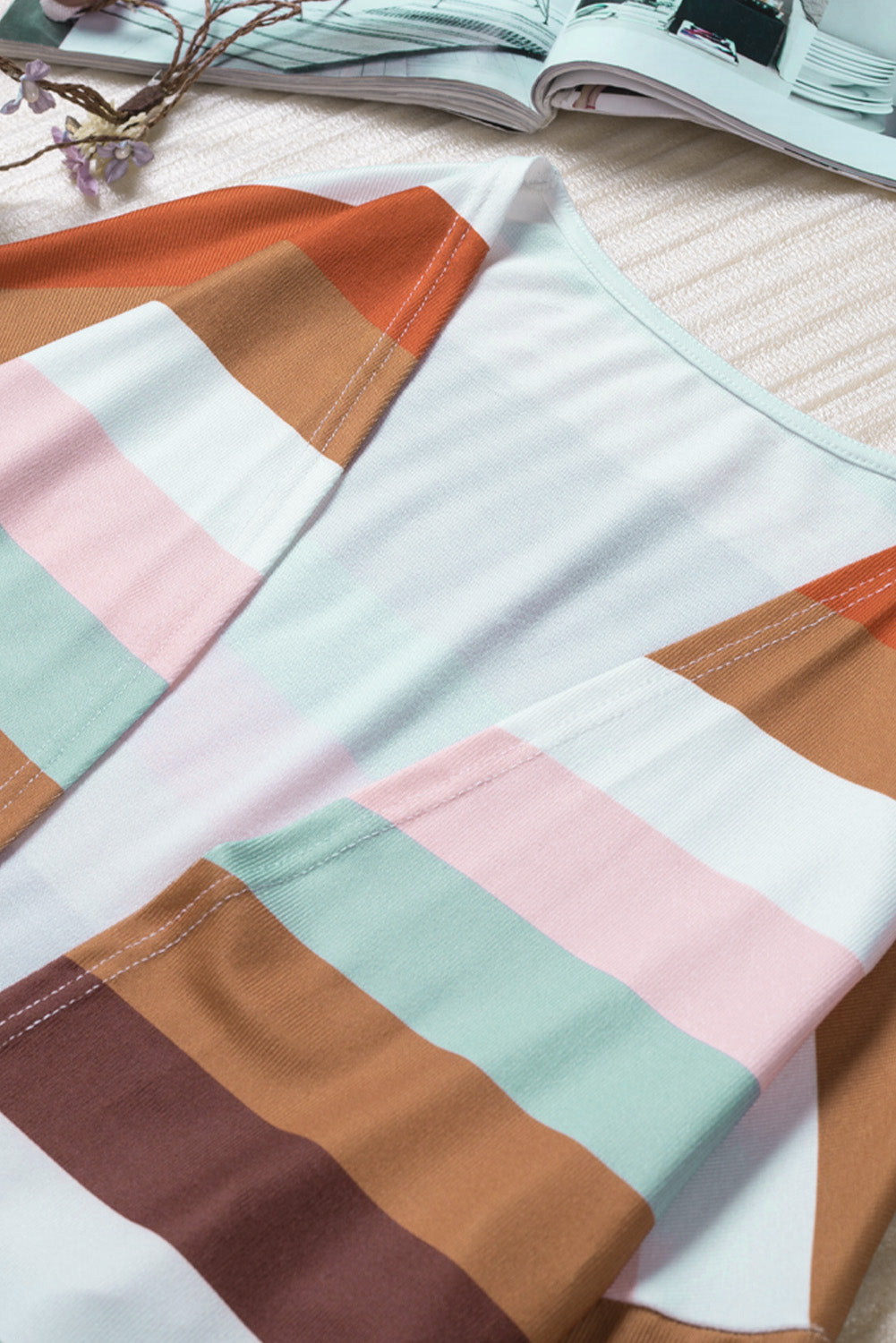 Brown stripe print open front plus size cardigan with pockets, showcasing a stylish design and lightweight knit fabric.