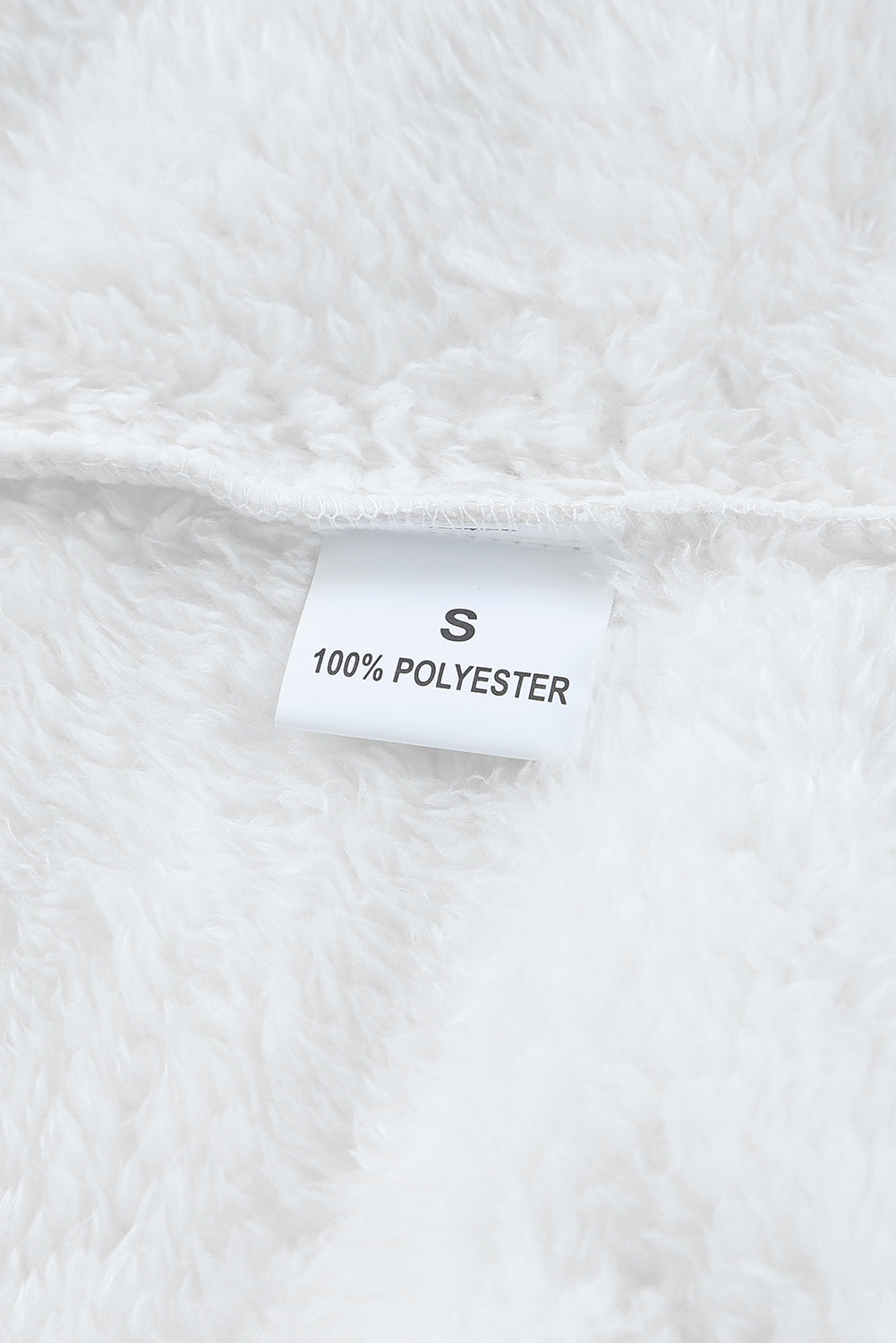 Brown oversized fleece pullover with zip neck and kangaroo pocket, perfect for winter wear.