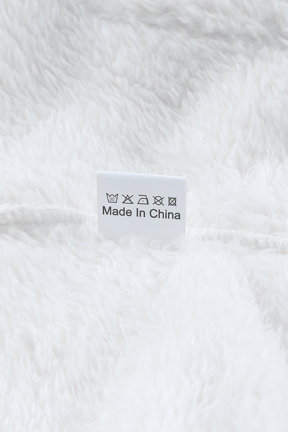 Brown oversized fleece pullover with zip neck and kangaroo pocket, perfect for winter wear.